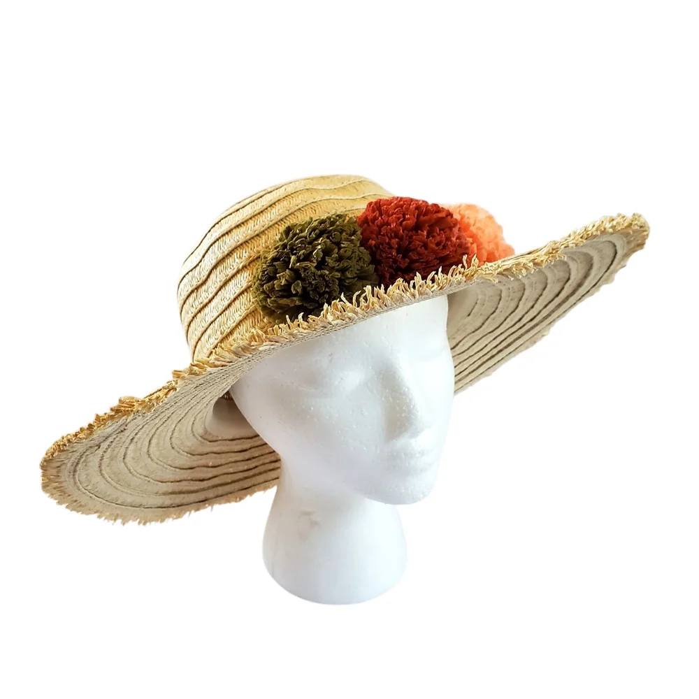 Tan and Green Wide-Brimmed Hat with Colorful Accents